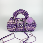 Handmade crochet handbag in purple and lilac with a bag charm by Studio YUK