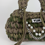 Handmade crochet handbag in a green and taupe mix with a bag charm by Studio YUK