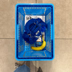 Lifestyle image featuring the blue Studio YUK crochet handbag