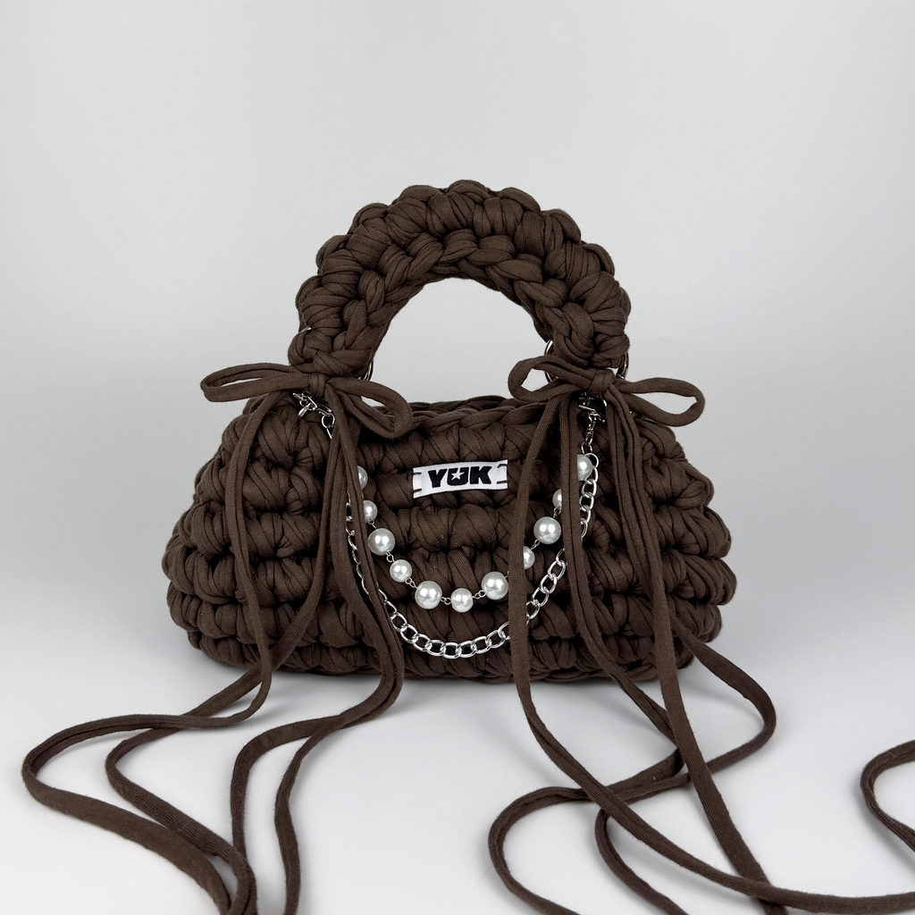 Handmade crochet handbag in brown with a bag charm by Studio YUK